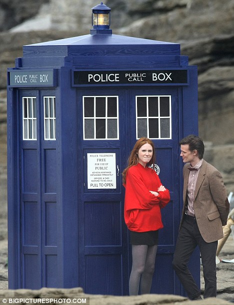 Gillan and Smith on set with the retro-feel TARDIS.